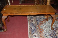 Lot 1355 - A figured walnut low coffee table, together...