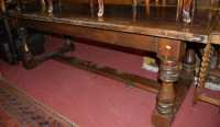 Lot 1362 - A joined oak plank top refectory table having...
