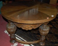 Lot 1371 - A carved oak circular low occasional table,...