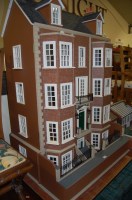 Lot 1375 - A large five storey dolls house having slate...