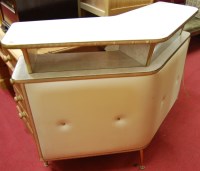 Lot 1301 - A 1950s cream padded vinyl clad bar, having...