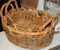 Lot 1298 - A set of two graduated wicker baskets