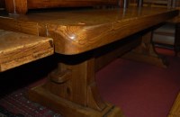 Lot 1387 - A heavy contemporary oak trestle end refectory...