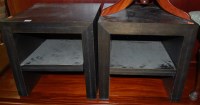 Lot 1394 - A pair of contemporary ebonised two-tier...