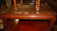 Lot 1400 - A contemporary Chinese hardwood low square...