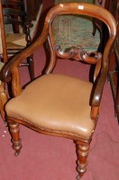 Lot 1407 - A Victorian mahogany balloon back elbow chair,...