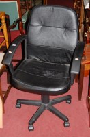 Lot 1411 - A contemporary black leather upholstered...