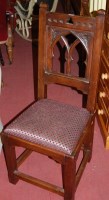 Lot 1424 - A Gothic style joined hardwood single dining...