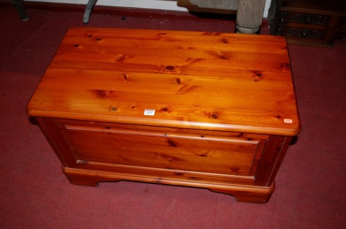 Lot 1109 - A modern Ducal stained pine blanket box,...