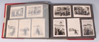 Lot 621 - A WW II photograph album and contents to...