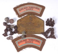 Lot 459 - A collection of mainly economy cap badges...