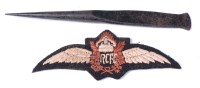 Lot 632 - A post WW II RCFC cloth wing badge, together...