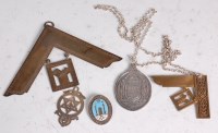 Lot 676 - An early 20th century silver Masonic set...