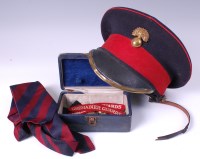 Lot 502 - A Grenadier Guards peaked cap of typical form...