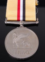 Lot 426 - An Iraq medal (2004) naming 25106686 CFN K J C...