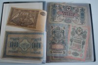 Lot 307 - A folder of Russian and German banknotes, to...