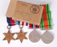 Lot 416 - A group of four WW II medals to include...