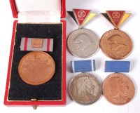 Lot 477 - A GDR Border Force medal in a fitted leather...