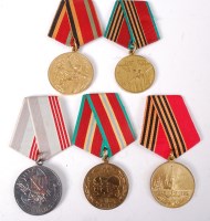 Lot 481 - A group of five Russian medals to include 30,...