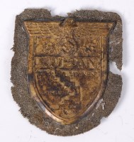 Lot 495 - A German Kuban armshield on a cloth backing.