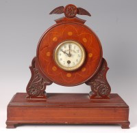 Lot 504 - A WW I period mahogany propeller mantel clock,...