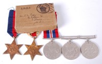 Lot 515 - A collection of five WW II medals to include,...