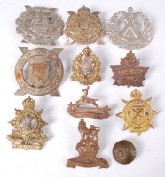 Lot 518 - A collection of cap badges of various...