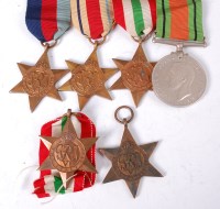 Lot 523 - A group of six WW II medals to include,...