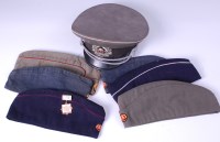 Lot 551 - A DDR Army Officer's peaked cap, size 57,...