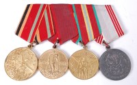 Lot 471 - A group of four Russian medals to include 30...