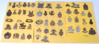 Lot 561 - A collection of assorted cap badges mainly...