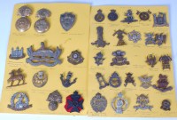 Lot 567 - A collection of cap badges from various...