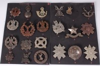 Lot 569 - A collection of Scottish regiment cap badges...