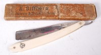 Lot 584 - A cut throat razor, the folding blade stamped...