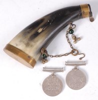 Lot 597 - A 19th century horn and brass mounted powder...