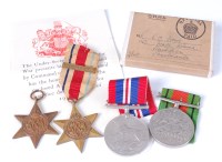 Lot 457 - A group of four WW II medals to include...