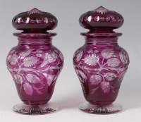 Lot 1069 - A pair of Stevens & Williams purple overlay...