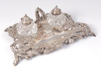 Lot 1106 - A mid-Victorian silver inkstand, having a...