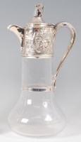 Lot 1111 - A mid-Victorian glass and silver topped claret...