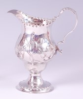 Lot 1130 - A George III silver pedestal cream jug, of...