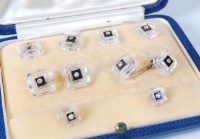 Lot 1147 - A cased set of rock crystal and diamond set...