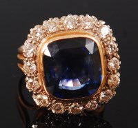 Lot 1158 - An 18ct gold, sapphire and diamond set ring,...