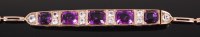 Lot 1165 - An Edwardian gilt metal, amethyst and white...