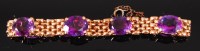 Lot 1166 - An 18ct gold expanding chainlink and amethyst...