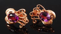 Lot 1172 - A pair of 18ct gold amethyst set ear clips,...