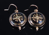 Lot 1191 - A pair of 9ct gold backed pique worked ear...