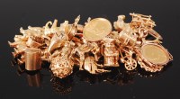 Lot 1192 - A 9ct gold bracelet, containing large quantity...