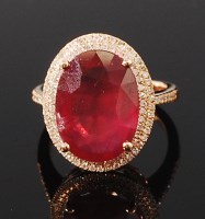 Lot 1212 - A 14ct gold, ruby and diamond set dress ring,...