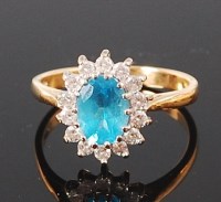 Lot 1218 - A modern 18ct gold, pale blue sapphire and...