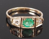 Lot 1220 - An 18ct gold, emerald and diamond dress ring,...